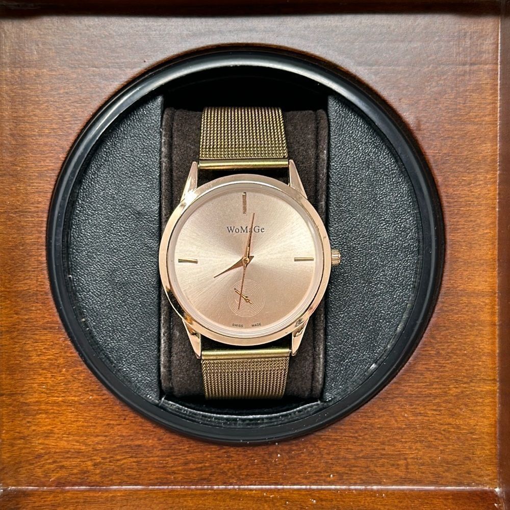 Womage rose gold tone watch